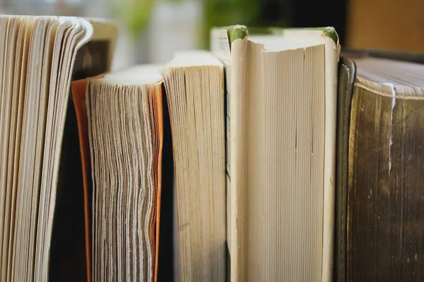 A collection of books with digital signage industry terms.