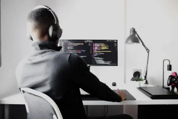A developer working with the Screenly API and other resources to build a custom digital signage solution.