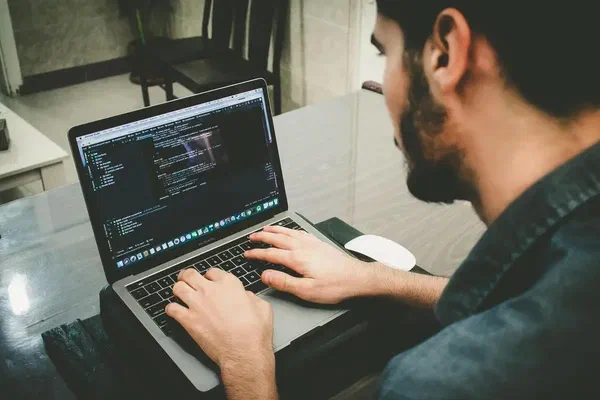 Screenly OSE open source digital signage software on a laptop.